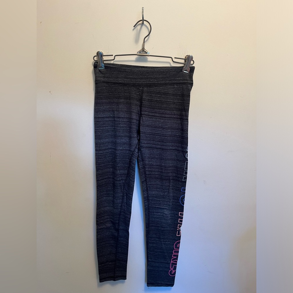SO, girls youth grey leggings with wording down the side of left leg.